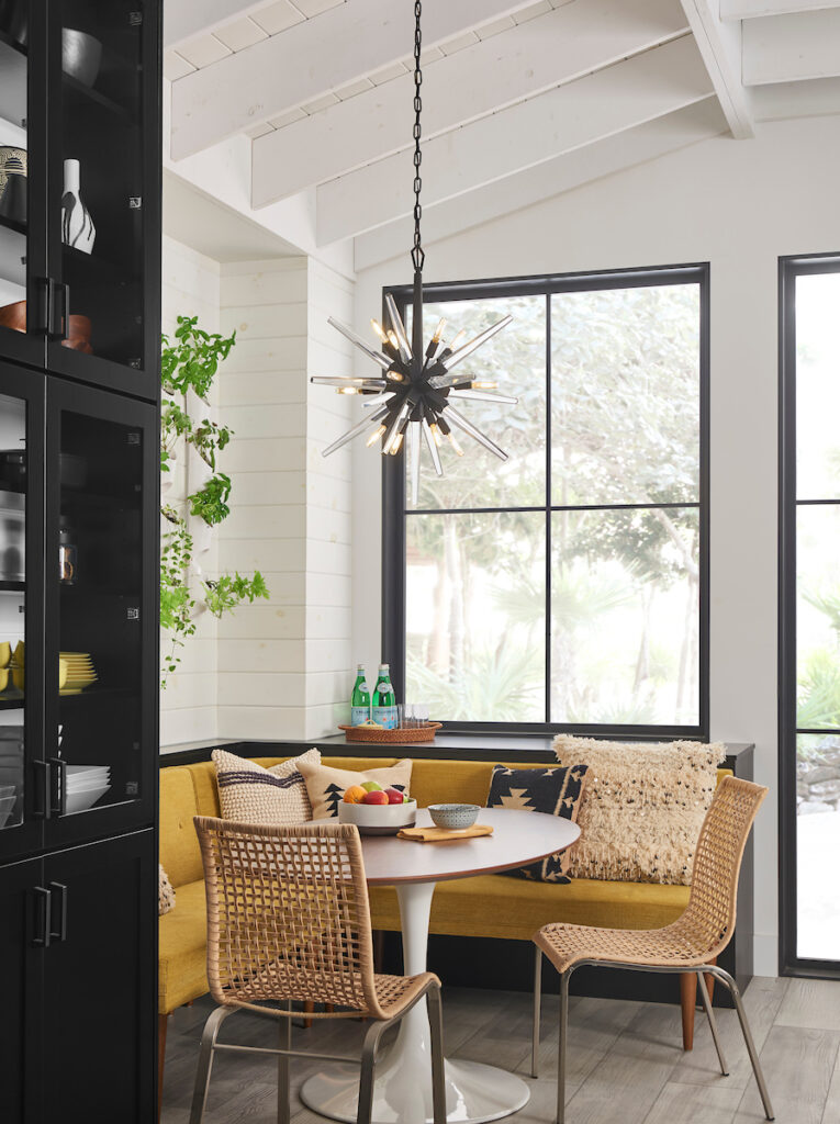 Hinkley Ariel chandelier hanging over kitchen table. | Lighting One blog.