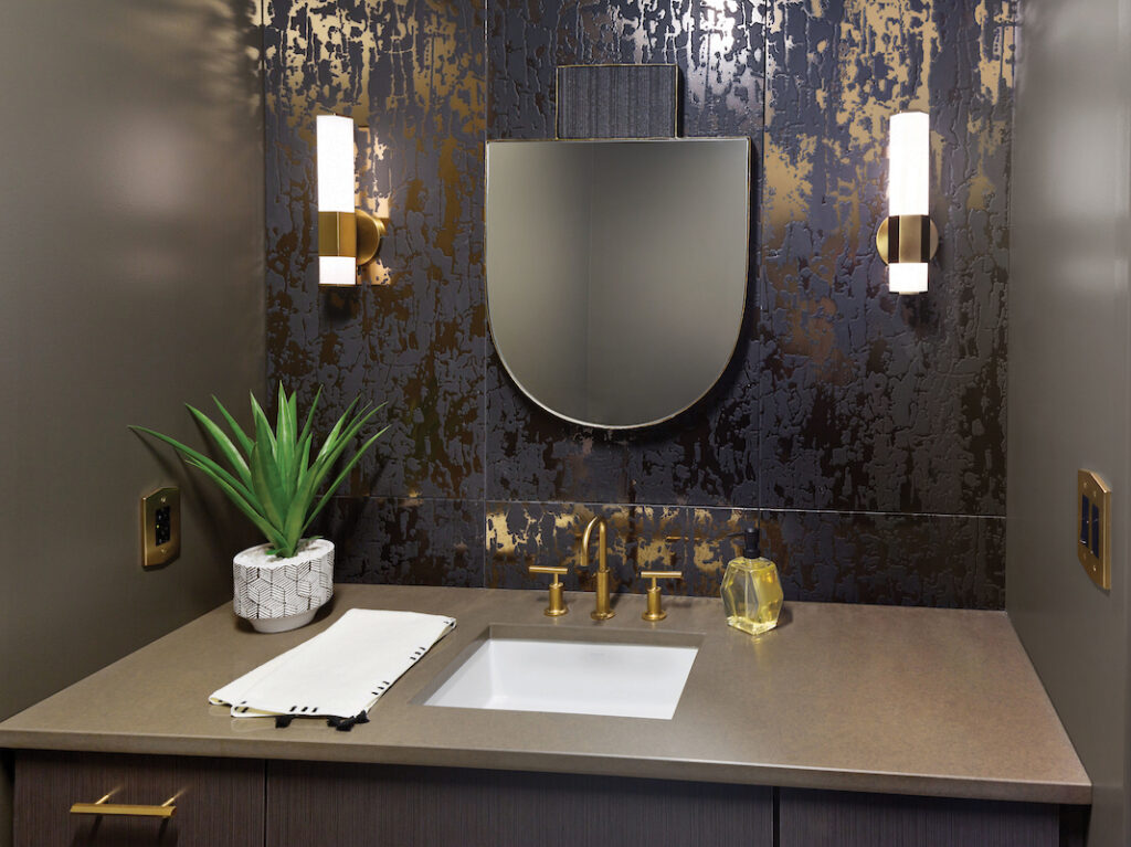 Hinkley Facet LED bath lights next to bathroom mirror. | Lighting One blog.