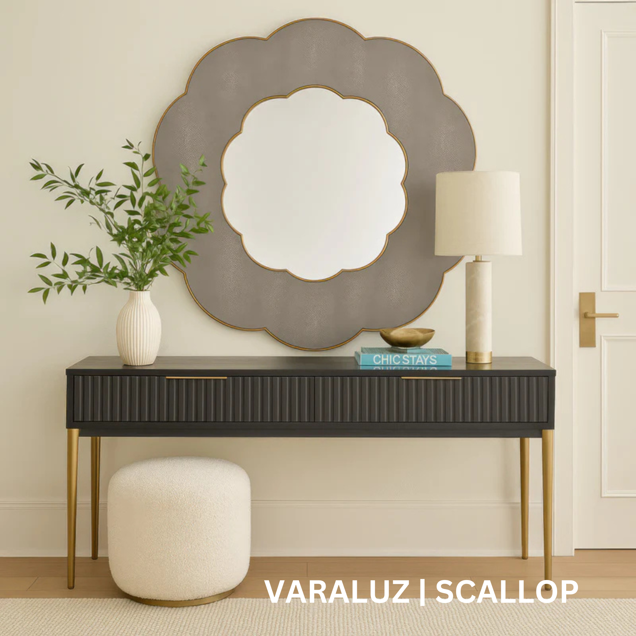 Mirror and frame both with scalloped edges.